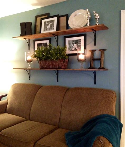 Decorating Floating Shelves In Living Room Atitudeemude