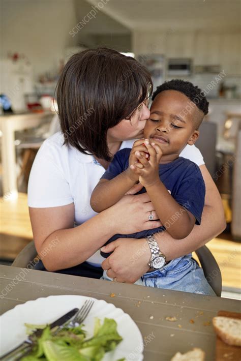 Mother Kissing Son Stock Image F Science Photo Library