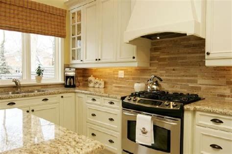 Primer will help protect your cabinets, and it will also create a smooth base to help you get better adhesion and truer color from your paint. Ivory Kitchen Cabinets - Transitional - kitchen - Jennifer ...