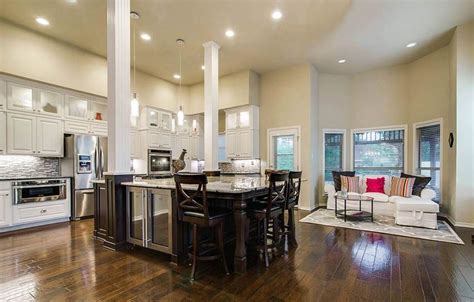 Even if there isn't much space in this kitchen, it managed to add two islands with beautiful sophisticated design. Kitchen Islands with Columns (With images) | Large kitchen ...