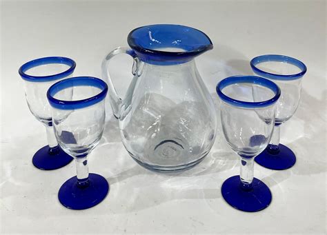 Lot A Modern Art Glass Jug With Four Matching Water Goblets