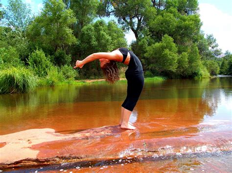 Flexible Woman Doing Backbend Yoga Pose Outdoors