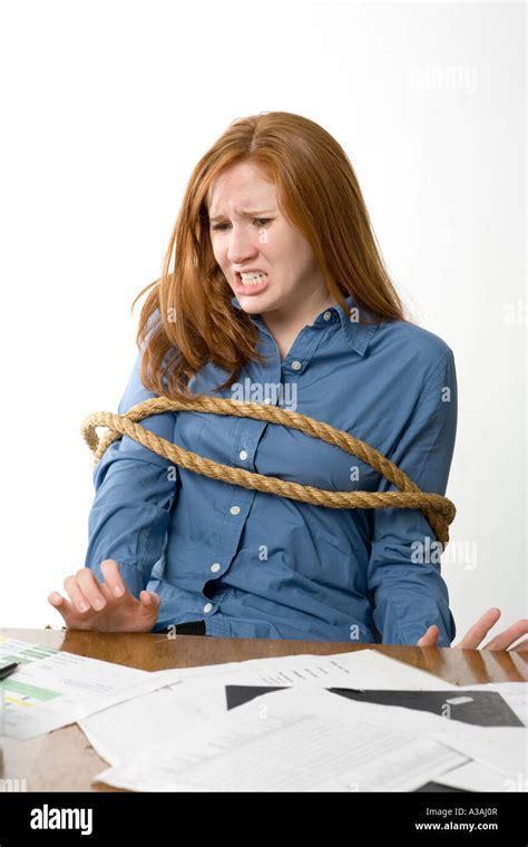 Woman Tied To Her Office Chair Stock Photo Alamy