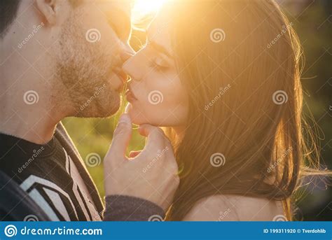 Loving Couple Kissing Outdoor At Sunset Love And Lifestyle Sensual