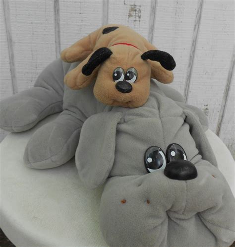If you stop playing with them, these toy pups will remind you they're still there with a friendly yelp. 80s Toy Pound Puppy Set of Two Grey Mother and Newborn Brown