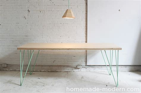 This diy modern dining table features custom steel table legs that are made out of 3 x 3 x 3/16 steel angles and an oak table top made out of ¾ thick back from home depot. HomeMade Modern EP41 The Easy DIY Table