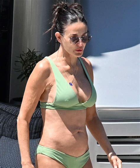 Demi Moore Shows Off Her Fit Figure In Green Bikini Photos