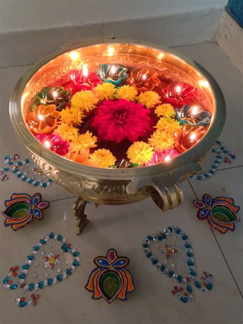 However, the devotion is the indispensable part of any pooja, by which, even simple gestures and poojas are like sacred rituals. Flowers in an urli | Diwali decorations at home, Diwali ...