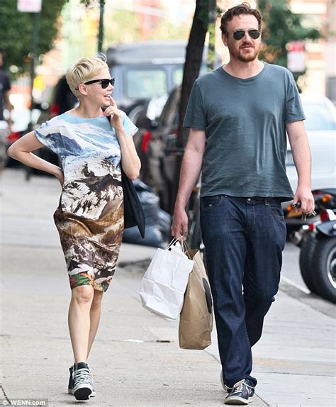 Michelle Williams Cradles Matilda As She And Jason Segel Land In Los