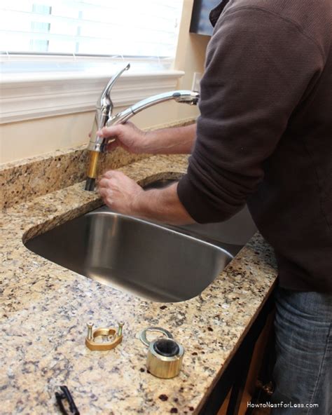 Either you are renovating your kitchen or the faucet of your kitchen is worn out and you need to the ways to install a faucet is very easy and can be done easily by a homeowner with simple plumbing. How to Install a Kitchen Faucet - How to Nest for Less™
