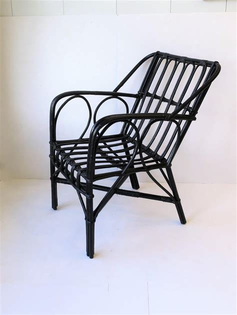 Only our showroom is closed. Vintage Black Wicker Rattan Armchair For Sale at 1stdibs