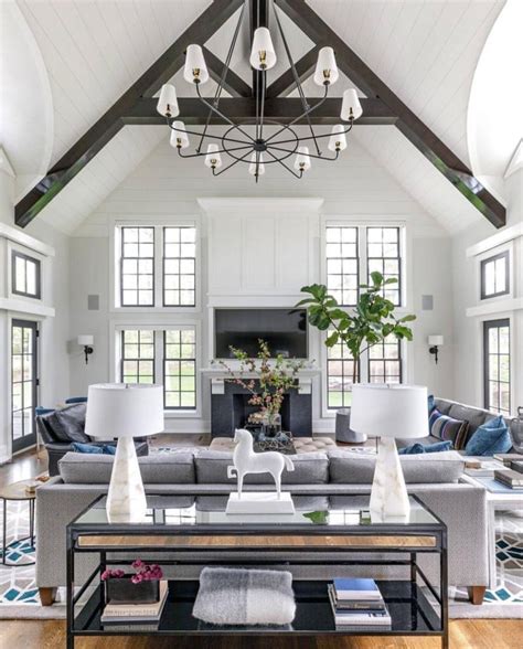 High Vaulted Ceilings With White Walls And Gray Couch Desain