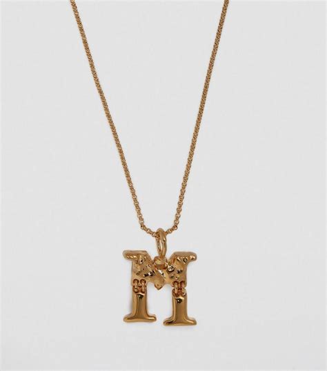 An encapsulated poem of your inner essence. Chloé Hinged Alphabet Necklace in Metallic - Lyst