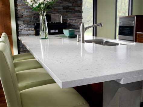 Quartz countertops are produced by combining ground natural quartz with a resin plus binders and the a quartz countertop is a dense, nonporous surface that is consistent in color and texture. Cambria Quartz Countertops go to http://remoldingyourhome ...