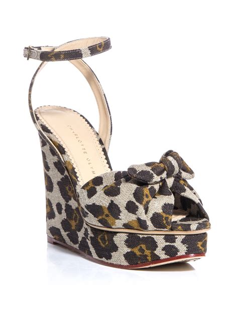 Founder and publisher @dobookco, two children and a dog, e5. Charlotte Olympia Miranda Signature Wedges in Animal ...