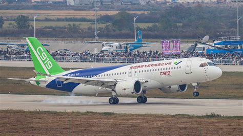 Chinas C919 Jet Makes Maiden Airshow Flight Cgtn