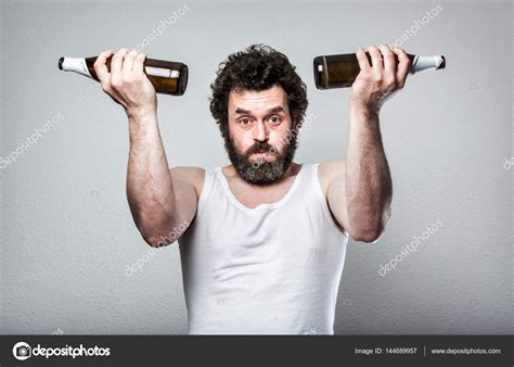 Weightlifting With Beer Bottles Bearded Beer Man Looking Very Tired