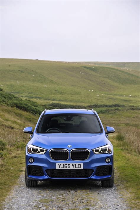 The fender trims and rocker. 2016 BMW X1 M Sport Package in Estoril Blue - Photos