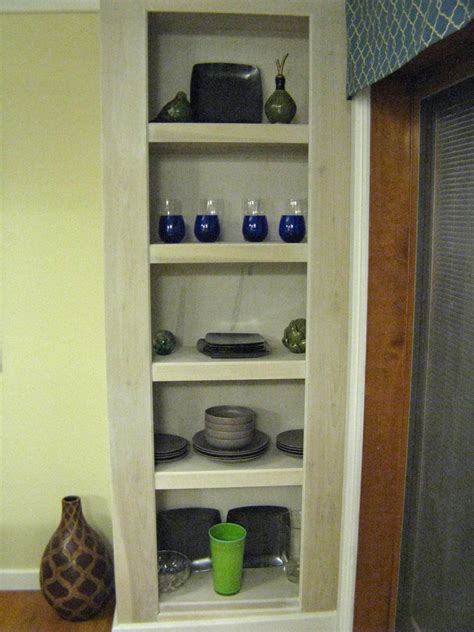 Plywood with a sharp utility knife at a height 1 in. Building a Floor-to-Ceiling Shelving Unit | HGTV