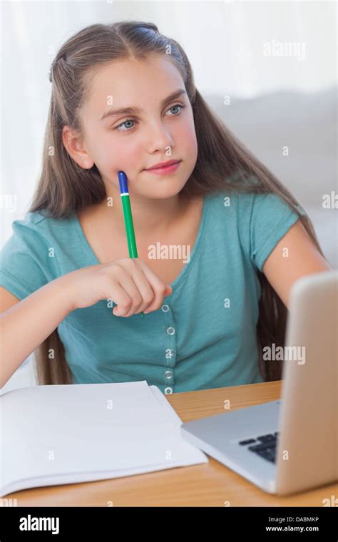 Girl Textbook Thinking Hi Res Stock Photography And Images Alamy