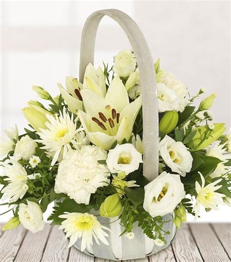 Creating warm, beautiful flower arrangements wrapped elegantly and delivered to a location of your choosing. Send Sympathy & Funeral Flowers to the UK | 1800Flowers.com