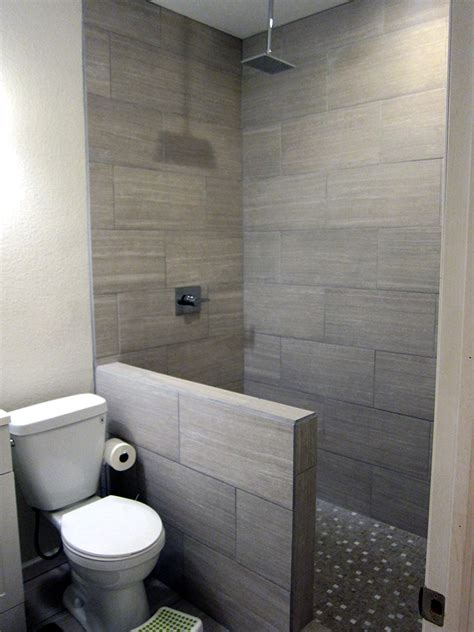 Measure the top and bottom of the shower wall (ours is 82 long) to make sure it is straight and does not slant in or out. How To Finish A Basement Bathroom - Before and After Pictures