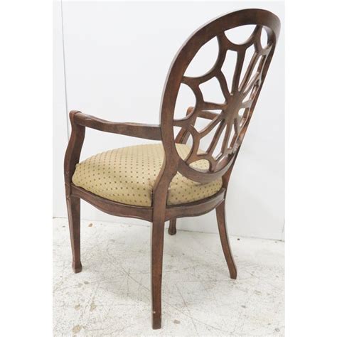 The picket house furnishings emery chair is a fresh and trendy addition to any contemporary living room. Walnut French Style Pinwheel Back Arm Chair | Chairish