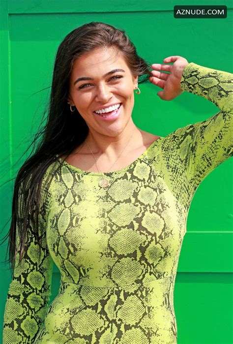 Lydia Clyma In A Bright Green Snakeskin Outfit As She Was