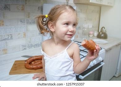 Funny Hungry Baby Girl Eats Smoked Stock Photo 1257915337 Shutterstock