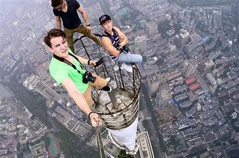 Daredevils Climb To The Top Of The Worlds Tallest Towers In Quest For
