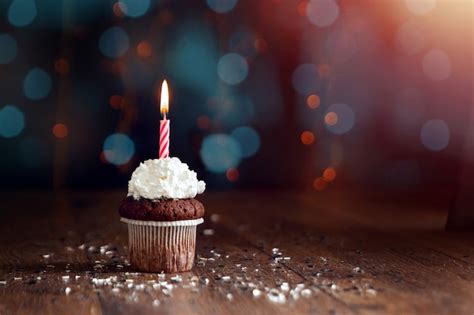 Premium Photo Cupcake With Candles Beautiful Bokeh Happy Birthday