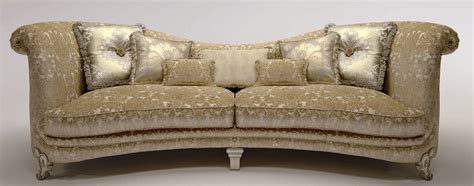 A furniture piece that was associated with outdoor furniture for way too long! Upholstered Sofa with Curved Backrest