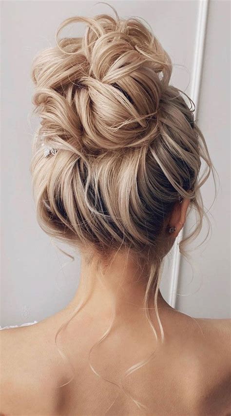 Updo Hairstyles For Your Stylish Looks In Messy High Bun In High Bun Hairstyles