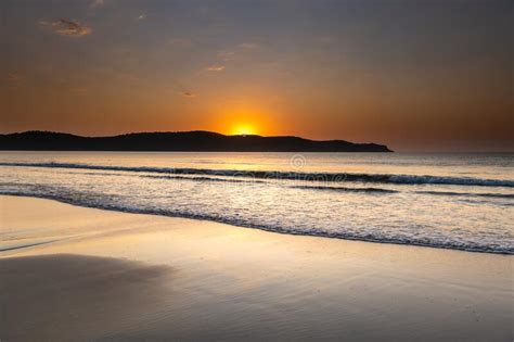 Hot Summer Sunrise Seascape From The Beach With Sun Rising Over