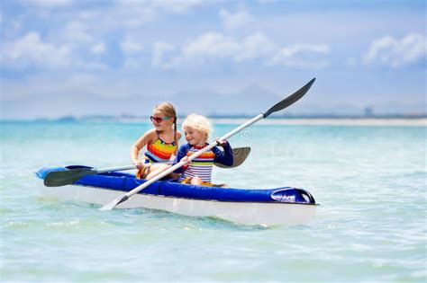 Kids Kayaking In Ocean Children In Kayak In Tropical Sea Stock Image