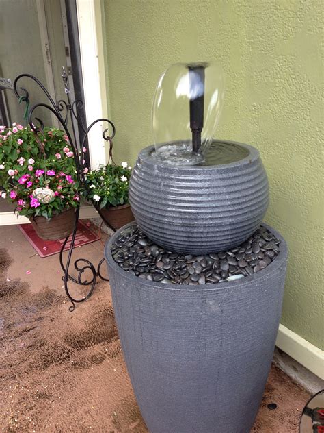 A Diy Patio Fountain Made From Flower Pots Rocks And A Water Pump Diy