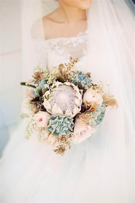 Maybe you would like to learn more about one of these? A King Protea Bridal Bouquet for a Destination Wedding ...