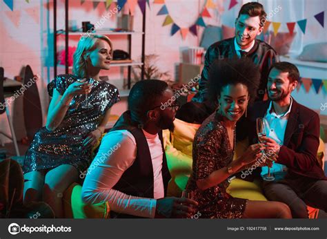 Multiracial Smiling Friends Having Party Drinks Decorated Room ⬇ Stock