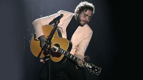 See Post Malone Play A Guitar Cover Of Eric Johnsons Cliffs Of Dover