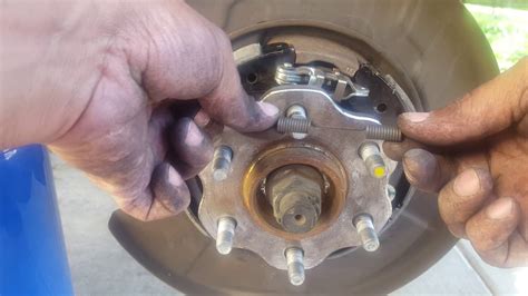 How To Replace Parking Brake Shoes Drums Nissan Pathfinder Youtube
