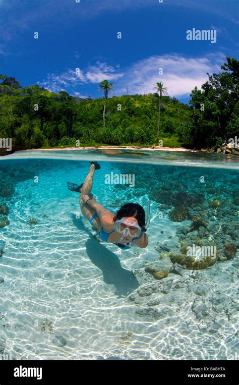 Snorkeling In Raja Empat Papua Indonesia Female Diver Bikini Clear Water Shallow Water