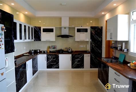 Modular kitchen designs with red and white color combination. 7 finishes to choose from for your Modular Kitchen - Truww