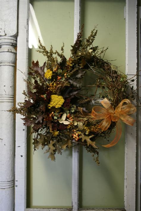 In the garden, the plants are stunning beside blue flowers. Dried flower wreath, floral wreath, front door wreath ...