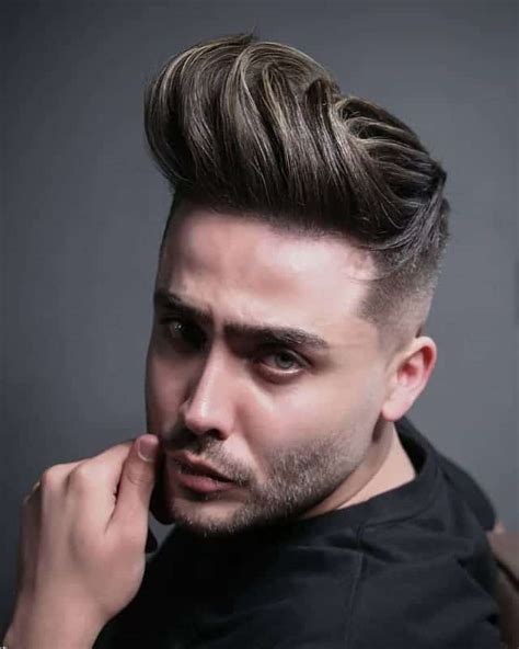 High fade with loose pompadour. 11 Bewildering Low Fade Haircuts for Men with Long Hair 2020