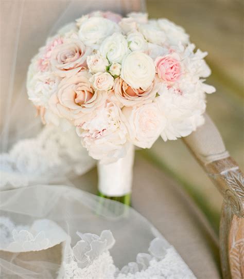 Paired with the flowers is a keepsake clear vase that is wrapped in a decorative ribbon. Wedding Flowers: Stylish Pink Bridal Bouquets - Inside ...