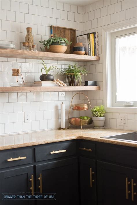 Kitchen cabinet soffits are empty spaces between cabinets and ceiling. Kitchen Reveal with Dark Cabinets and Open Shelving ...