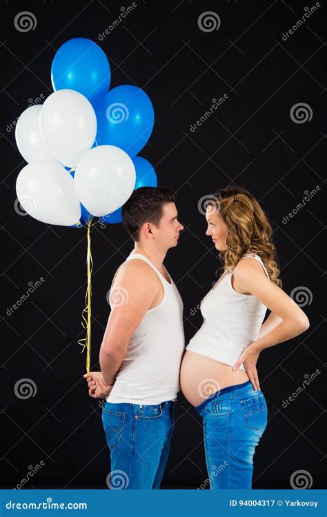 The Husband Gives His Pregnant Wife Balloons Stock Image Image Of Maternity Balloons 94004317