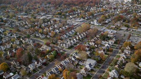 6k Stock Footage Aerial Video Fly Over Suburban Houses In Autumn West Hempstead New York
