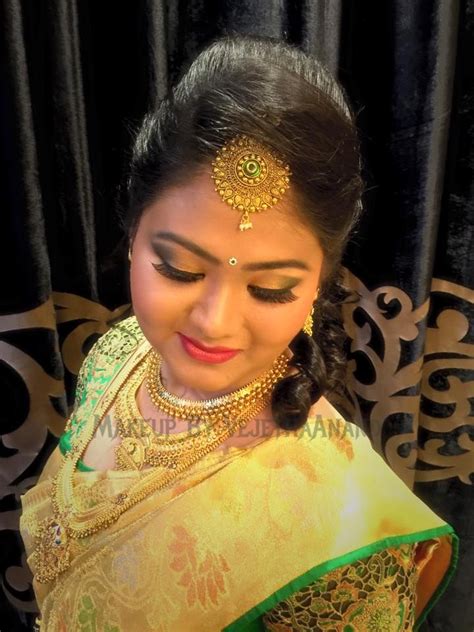 Traditional Southern Indian Bride Wearing Bridal Silk Saree And Jewellery Reception Look