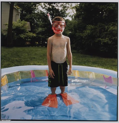 Boy Wearing A Snorkel In Pool High Res Stock Photo Getty Images